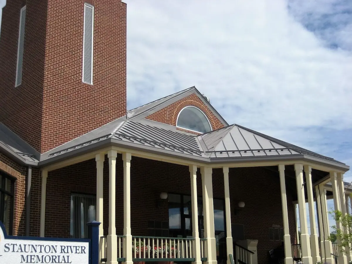 Skilled roofing craftsmen working on a residential roof in Millville